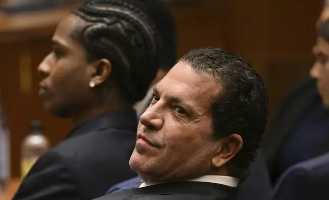 Attorney Joe Tacopina sits next to his client A$AP Rocky during Rocky's trial, in Los Angeles, Friday, Feb. 14, 2025, . (Patrick T. Fallon/Pool Photo via AP)