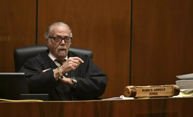 Judge Mark S. Arnold presides over A$AP Rocky's trial, in Los Angeles, Friday, Feb. 14, 2025, i. (Patrick T. Fallon/Pool Photo via AP)