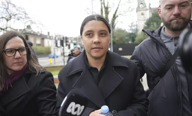Australian football star, Chelsea striker Samantha Kerr arrives a court as she was charged with causing a police officer harassment, alarm or distress during an incident in Twickenham, in London, Monday, Feb. 3, 2025. (AP Photo/Kin Cheung)