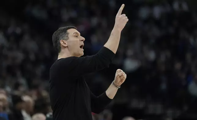 Oklahoma City Thunder head coach Mark Daigneault yells during the first half of an NBA basketball game against the Minnesota Timberwolves, Sunday, Feb. 23, 2025, in Minneapolis. (AP Photo/Abbie Parr)