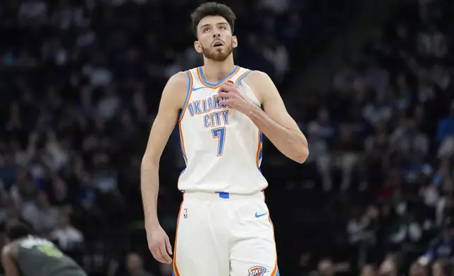Oklahoma City Thunder forward Chet Holmgren (7) walks across the court during the first half of an NBA basketball game against the Minnesota Timberwolves, Sunday, Feb. 23, 2025, in Minneapolis. (AP Photo/Abbie Parr)