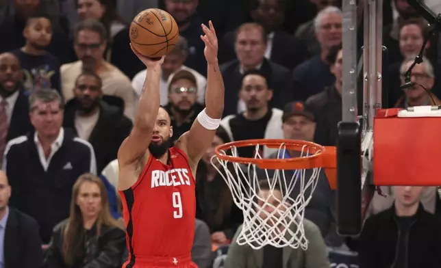 Houston Rockets' Dillon Brooks shoots the ball during the first half of an NBA basketball game against the New York Knicks, Monday, Feb. 3, 2025, in New York. (AP Photo/Pamela Smith)