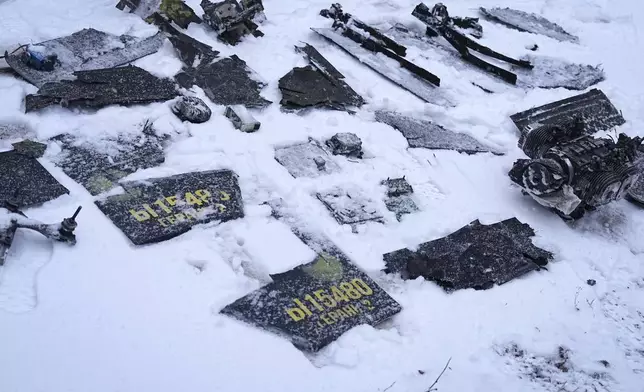 Fragments of an explosive device are displayed by Ukrainian authorities after a drone attack at the former Chernobyl nuclear power plant, Ukraine, Friday, Feb. 14, 2025. (AP Photo/Efrem Lukatsky)