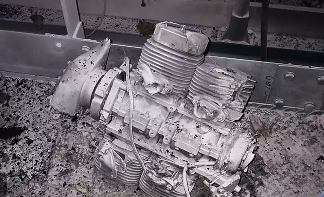 In this photo provided by the Ukrainian Emergency Service, damages of sarcophagus that covers the destroyed 4th reactor of Chernobyl nuclear power plant is seen from inside following a Russian drone attack in Chernobyl, Ukraine, Friday, Feb. 14, 2025. (Ukrainian Emergency Service via AP)