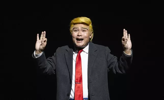 Cantonese opera actor Lung Koon-tin portraying U.S. President Donald Trump performs in the “Trump on Show” production at the Sunbeam Theatre in Hong Kong, Monday, Feb. 3, 2025. (AP Photo/Chan Long Hei)