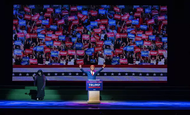 Cantonese opera actor Lung Koon-tin portraying U.S. President Donald Trump performs in the “Trump on Show” production at the Sunbeam Theatre in Hong Kong, Monday, Feb. 3, 2025. (AP Photo/Chan Long Hei)