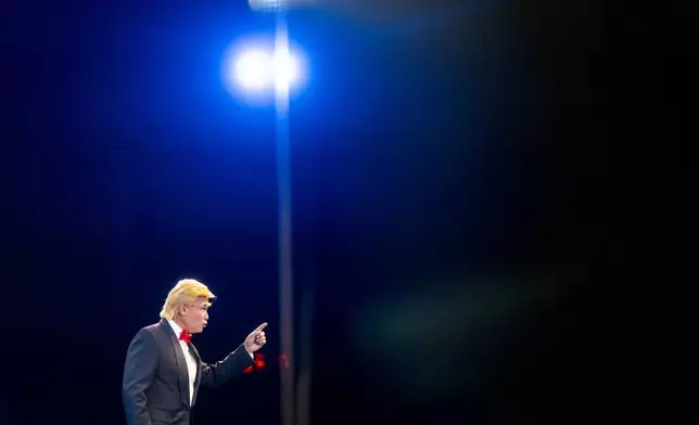 Cantonese opera actor Lung Koon-tin portraying U.S. President Donald Trump performs in the “Trump on Show” production at the Sunbeam Theatre in Hong Kong, Monday, Feb. 3, 2025. (AP Photo/Chan Long Hei)