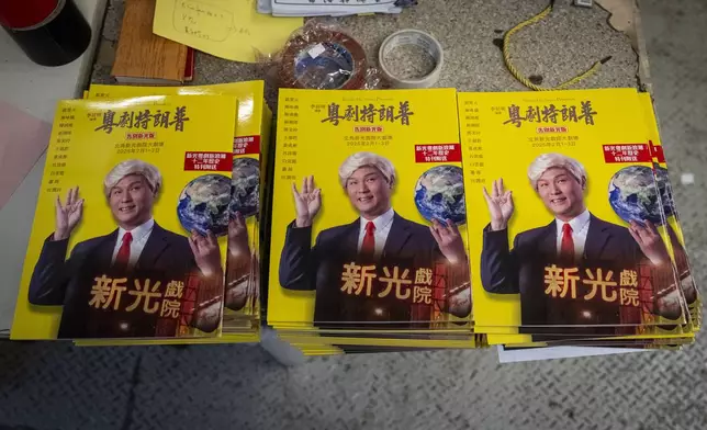 Booklets of the Cantonese opera “Trump on Show” production are displayed on a table at the Sunbeam Theatre in Hong Kong, Monday, Feb. 3, 2025. (AP Photo/Chan Long Hei)