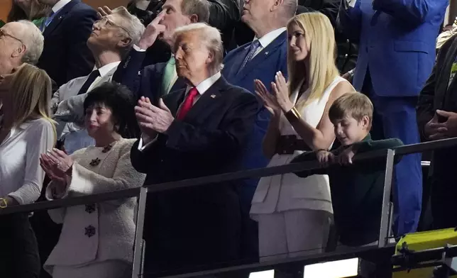 New Orleans Saints owner Gayle Benson, from left, President Donald Trump, his daughter Ivanka Trump and Ivanka Trump's son Theodore watch from a suite prior to the NFL Super Bowl 59 football game between the Philadelphia Eagles and the Kansas City Chiefs, Sunday, Feb. 9, 2025, in New Orleans. (AP Photo/Frank Franklin II)