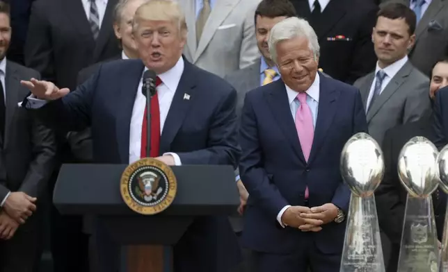 FILE - New England Patriots owner Robert Kraft, right, listen as President Donald Trump speaks during a ceremony on the South Lawn of the White House in Washington, April 19, 2017, where the president honored the Super Bowl Champion New England Patriots for their Super Bowl LI victory. (AP Photo/Andrew Harnik, File)