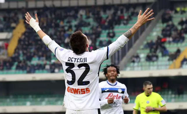 Atalanta's Mateo Retegui celebrates scoring his sides' fourth goal of the game during the Serie A soccer match between Hellas Verona and Atalanta at the Marcantonio Bentegodi Stadium, Verona, Italy, Saturday, Feb. 8 2025. (Paola Garbuio/LaPresse via AP)