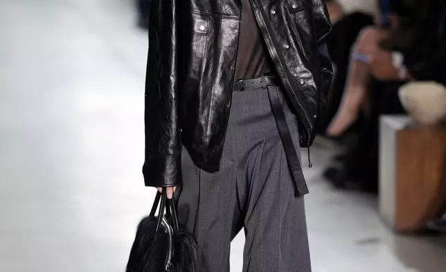 A model walks the runway during the Michael Kors Fall/Winter 2025 fashion show as part of New York Fashion Week on Tuesday, Feb. 11, 2025, at Terminal Warehouse in New York. (Photo by Charles Sykes/Invision/AP)