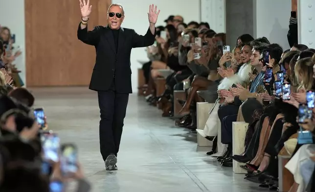 Michael Kors walks the runway during the Michael Kors Fall/Winter 2025 fashion show as part of New York Fashion Week on Tuesday, Feb. 11, 2025, at Terminal Warehouse in New York. (Photo by Charles Sykes/Invision/AP)