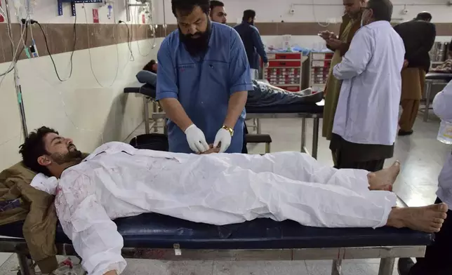 Injured victim of a roadside bomb explosion receives treatment at hospital in Quetta, Pakistan, Friday, Feb. 28, 2025. (AP Photo/Arshad Butt)
