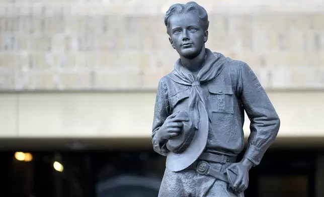 A bronze statue sits outside the Scouting America headquarters in Irving, Texas, Wednesday, Feb. 5, 2025. (AP Photo/LM Otero)