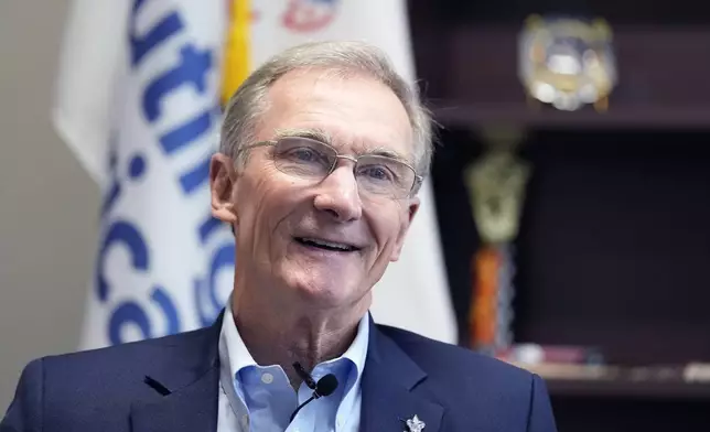 Roger Krone, chief executive officer of Scouting America, smiles during an interview at the organization's headquarters in Irving, Texas, Wednesday, Feb. 5, 2025. (AP Photo/LM Otero)