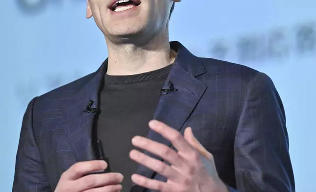OpenAI Chief Sam Altman delivers a speech during an event for enterprises, with SoftBank Chief Masayoshi Son, in Tokyo, in Tokyo, Monday, Feb. 3, 2025. (Kyodo News via AP)