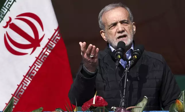 In this photo released by the Iranian Presidency Office, President Masoud Pezeshkian speaks during a rally commemorating anniversary of 1979 Islamic Revolution that toppled the late pro-U.S. Shah Mohammad Reza Pahlavi and brought Islamic clerics to power, in Tehran, Iran, Monday, Feb. 10, 2025. (Iranian Presidency Office via AP)