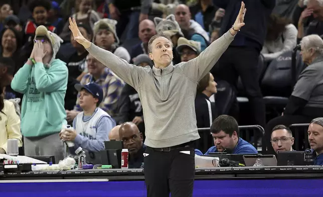 Washington Wizards head coach Brian Keefe reacts during the second half of an NBA basketball game against the Minnesota Timberwolves, Saturday, Feb. 1, 2025, in Minneapolis. (AP Photo/Matt Krohn)