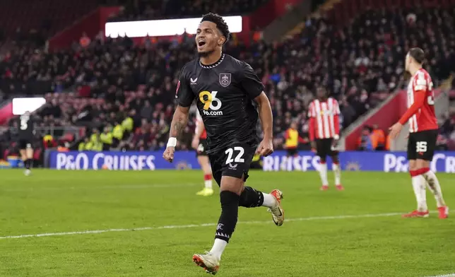 Burnley's Marcus Edwards celebrates scoring during the English FA Cup fourth round soccer match between Southampton and Burnley at St Mary's Stadium, Southampton, England, Saturday Feb. 8, 2025. (John Walton/PA via AP)