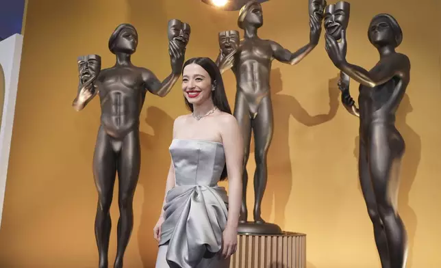 Mikey Madison arrives at the 31st annual Screen Actors Guild Awards on Sunday, Feb. 23, 2025, at the Shrine Auditorium in Los Angeles. (AP Photo/Chris Pizzello)
