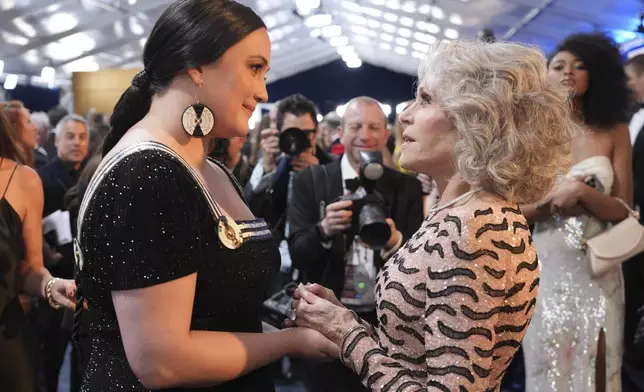 Lily Gladstone, left, and Jane Fonda arrive at the 31st annual Screen Actors Guild Awards on Sunday, Feb. 23, 2025, at the Shrine Auditorium in Los Angeles. (AP Photo/Chris Pizzello)