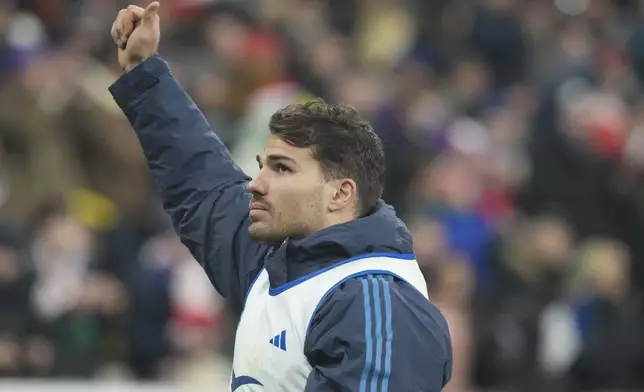 France's Antoine Dupont gestures after the Six Nations rugby union match between France and Wales at the Stade de France in Saint-Denis, outside Paris, Friday, Jan. 31, 2025. (AP Photo/Michel Euler)