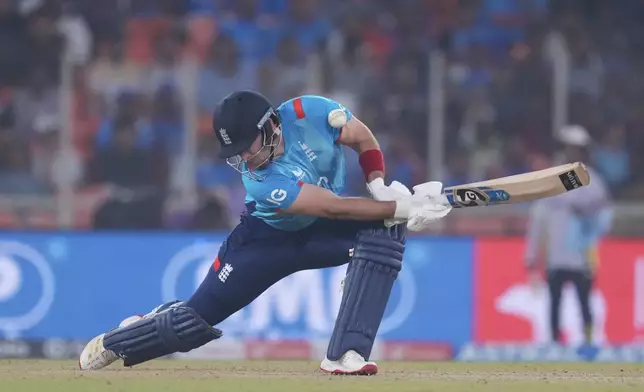 England's Liam Livingstone plays a shot during the third one day international cricket match between India and England in Ahmedabad, India, Wednesday, Feb. 12, 2025. (AP Photo/ Ajit Solanki )