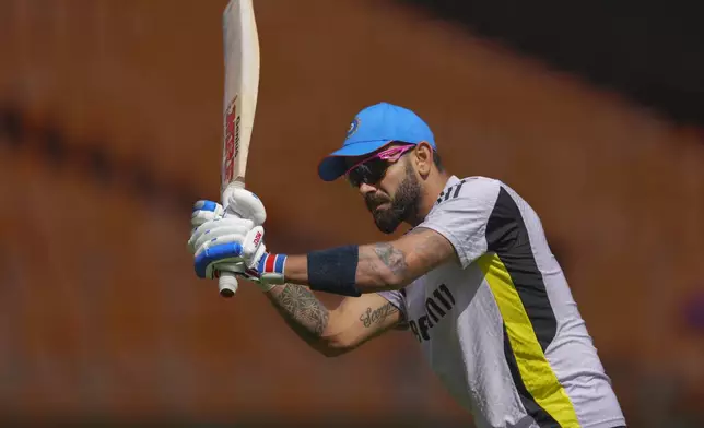 India's Virat Kohli warm up before the start of third one day international cricket match between India and England in Ahmedabad , India, Wednesday, Feb. 12, 2025. (AP Photo/ Ajit Solanki )