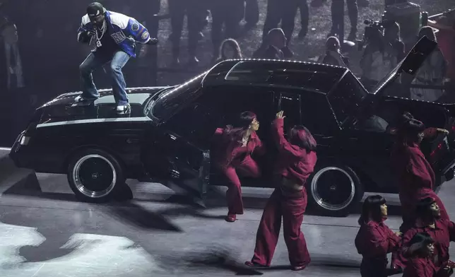 Kendrick Lamar performs during halftime of the NFL Super Bowl 59 football game between the Kansas City Chiefs and the Philadelphia Eagles, Sunday, Feb. 9, 2025, in New Orleans. (AP Photo/Charlie Riedel)