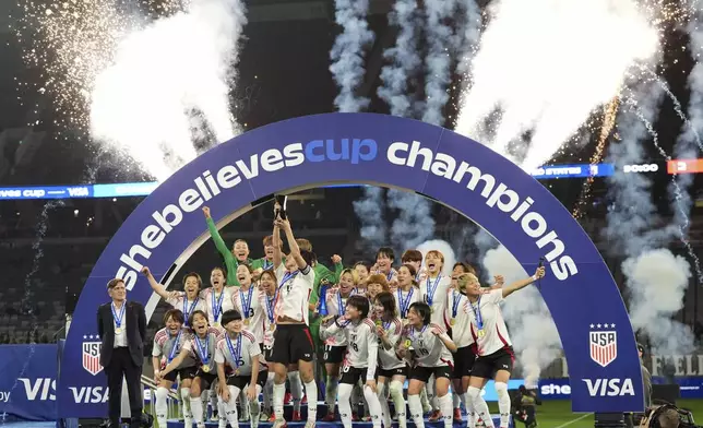 Players for Japan celebrate after defeating the United States to win the SheBelieves Cup women's soccer tournament Wednesday, Feb. 26, 2025, in San Diego. (AP Photo/Gregory Bull)