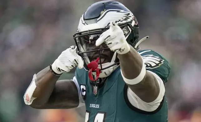 Philadelphia Eagles wide receiver A.J. Brown celebrates after a first down against the Washington Commanders during the first half of the NFC Championship NFL football game, Sunday, Jan. 26, 2025, in Philadelphia. (AP Photo/Seth Wenig)