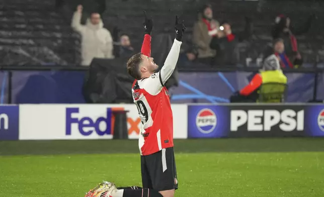 Feyenoord's Santiago Gimenez celebrates after scoring his side's second goal during the Champions League opening phase soccer match between Feyenoord and Bayern Munich, at De Kuip Stadium, in Rotterdam, Netherlands, Wednesday, Jan. 22, 2025. (AP Photo/Peter Dejong)