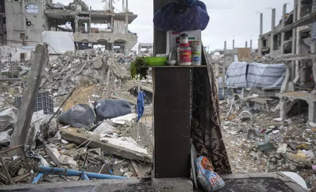 Destroyed walls expose the devastation outside the Odeh house in the Jabaliya refugee camp in the northern Gaza Strip, Friday, Feb. 7, 2025. (AP Photo/Abdel Kareem Hana)