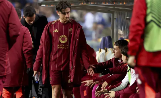 Roma's Paulo Dybala goes to the bench after being replaced during the Europa League playoff first leg soccer match between FC Porto and AS Roma at the Dragao stadium in Porto, Portugal, Thursday, Feb. 13, 2025. (AP Photo/Luis Vieira)