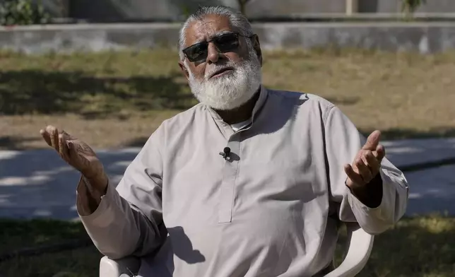 Khuda Bakhsh Hashim, a retired teacher, speaks during an interview with The Associated Press in the coastal city of Gwadar, in the southwest Pakistani province of Balochistan, Jan. 15, 2025. (AP Photo/Anjum Naveed)