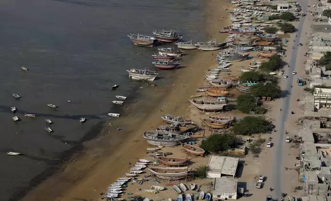Fishing boats are docked along the beach in the coastal city of Gwadar, in the southwest Pakistani province of Balochistan, Jan. 13, 2025. (AP Photo/Anjum Naveed)