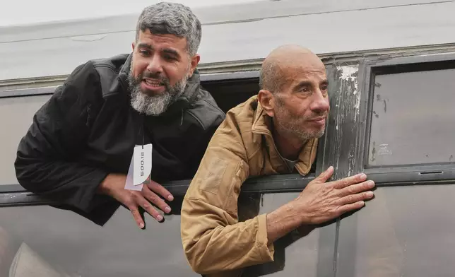 Freed Palestinian prisoners arrive in the Gaza Strip after being released from an Israeli prison following a ceasefire agreement between Hamas and Israel in Khan Younis, souther Gaza Strip, Saturday Feb. 8, 2025. (AP Photo/Abdel Kareem Hana)