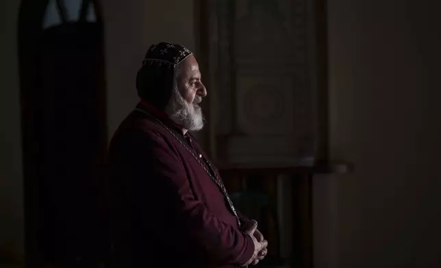 Mouris Amsih, archbishop of Christian Syriac Orthodox Church of Aljazira and Euphrates, stands for a portrait in the northeastern Syrian city of Hassakeh, Monday, Jan. 27, 2025. (AP Photo/Bernat Armangue)