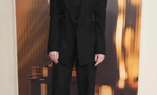 Coralie Fargeat arrives at the Oscars Nominees Dinner on Tuesday, Feb. 25, 2025, at the Academy Museum of Motion Pictures in Los Angeles. (Photo by Jordan Strauss/Invision/AP)