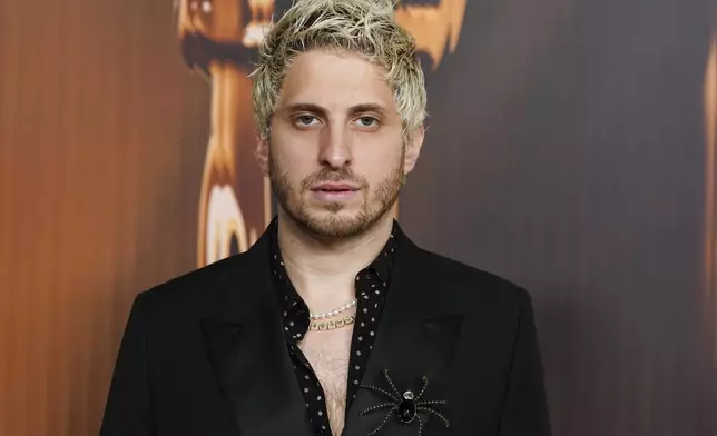 Andrew Watt arrives at the Oscars Nominees Dinner on Tuesday, Feb. 25, 2025, at the Academy Museum of Motion Pictures in Los Angeles. (Photo by Jordan Strauss/Invision/AP)