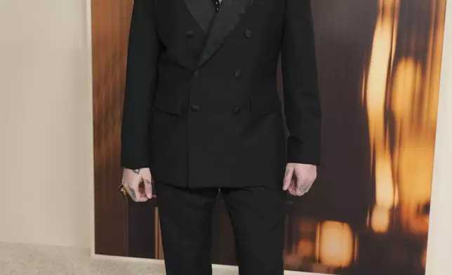 Andrew Watt arrives at the Oscars Nominees Dinner on Tuesday, Feb. 25, 2025, at the Academy Museum of Motion Pictures in Los Angeles. (Photo by Jordan Strauss/Invision/AP)
