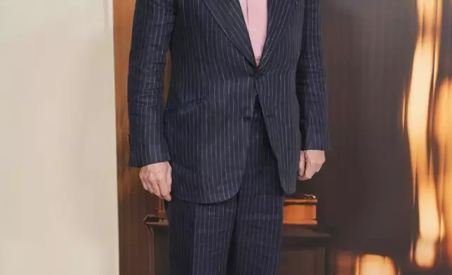 Ralph Fiennes arrives at the Oscars Nominees Dinner on Tuesday, Feb. 25, 2025, at the Academy Museum of Motion Pictures in Los Angeles. (Photo by Jordan Strauss/Invision/AP)