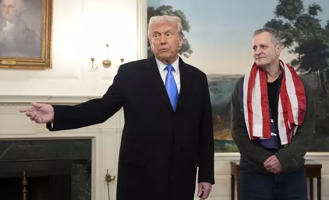 President Donald Trump, accompanied by Marc Fogel, speaks in the Diplomatic Reception Room at the White House, Tuesday, Feb. 11, 2025, in Washington. (Photo/Alex Brandon)