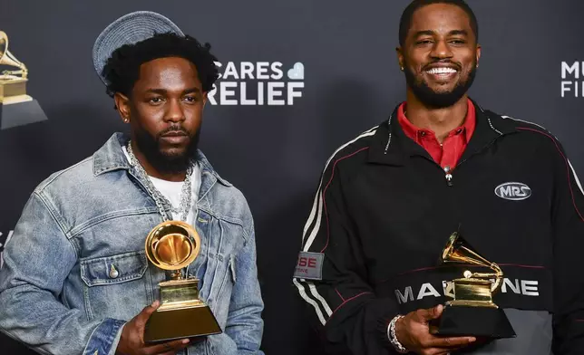 Kendrick Lamar , left, and Dave Free pose in the press room with the award for best music video for "Not Like Us," during the 67th annual Grammy Awards on Sunday, Feb. 2, 2025, in Los Angeles. (Photo by Richard Shotwell/Invision/AP)