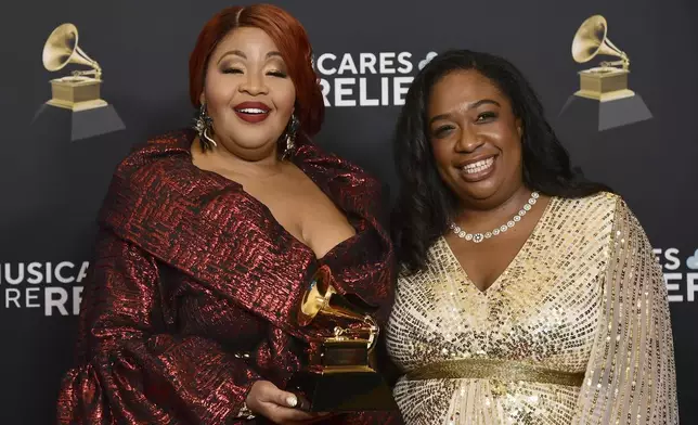Karen Slack, left, and Michelle Cann pose in the press room with the award for best classical solo vocal album for "Beyond The Years - Unpublished Songs Of Florence Price" during the 67th annual Grammy Awards on Sunday, Feb. 2, 2025, in Los Angeles. (Photo by Richard Shotwell/Invision/AP)