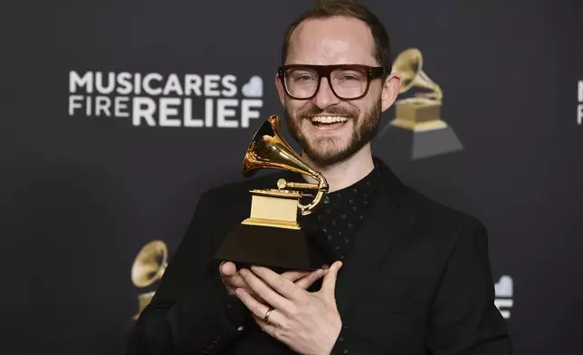 Pascal Le Boeuf poses in the press room with the award for best instrumental composition during the 67th annual Grammy Awards on Sunday, Feb. 2, 2025, in Los Angeles. (Photo by Richard Shotwell/Invision/AP)