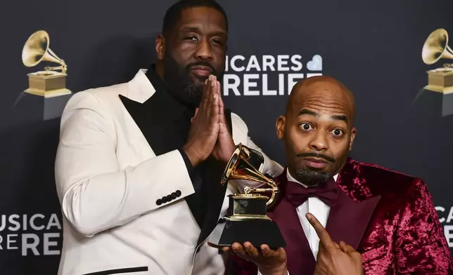 Adam Blackstone, left, and Brandon Victor Dixon pose in the press room with the award for best musical theater album during the 67th annual Grammy Awards on Sunday, Feb. 2, 2025, in Los Angeles. (Photo by Richard Shotwell/Invision/AP)
