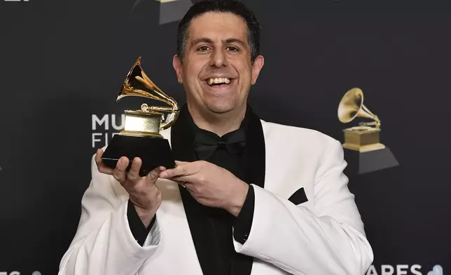 Ricky Riccardi, winner of the best album notes for "Centennial", poses in the press room during the 67th annual Grammy Awards on Sunday, Feb. 2, 2025, in Los Angeles. (Photo by Richard Shotwell/Invision/AP)