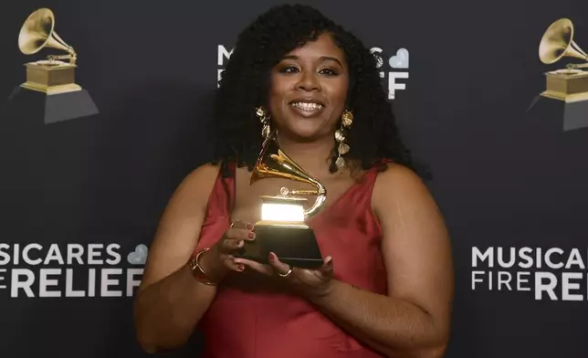 Lauren Domino poses in the press room with the award for best music film for "American Symphony" during the 67th annual Grammy Awards on Sunday, Feb. 2, 2025, in Los Angeles. (Photo by Richard Shotwell/Invision/AP)